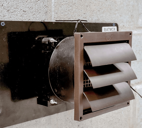 crawl space ventilation fan installed on the wall